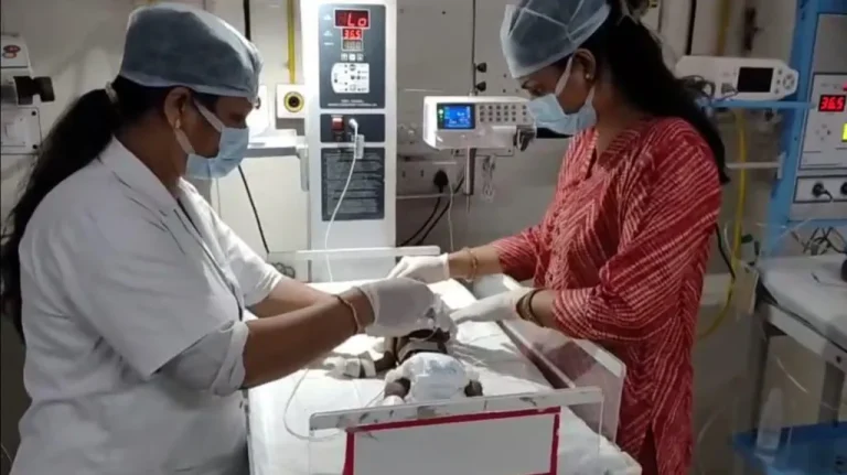 Newborn baby buried alive in India fights for her life